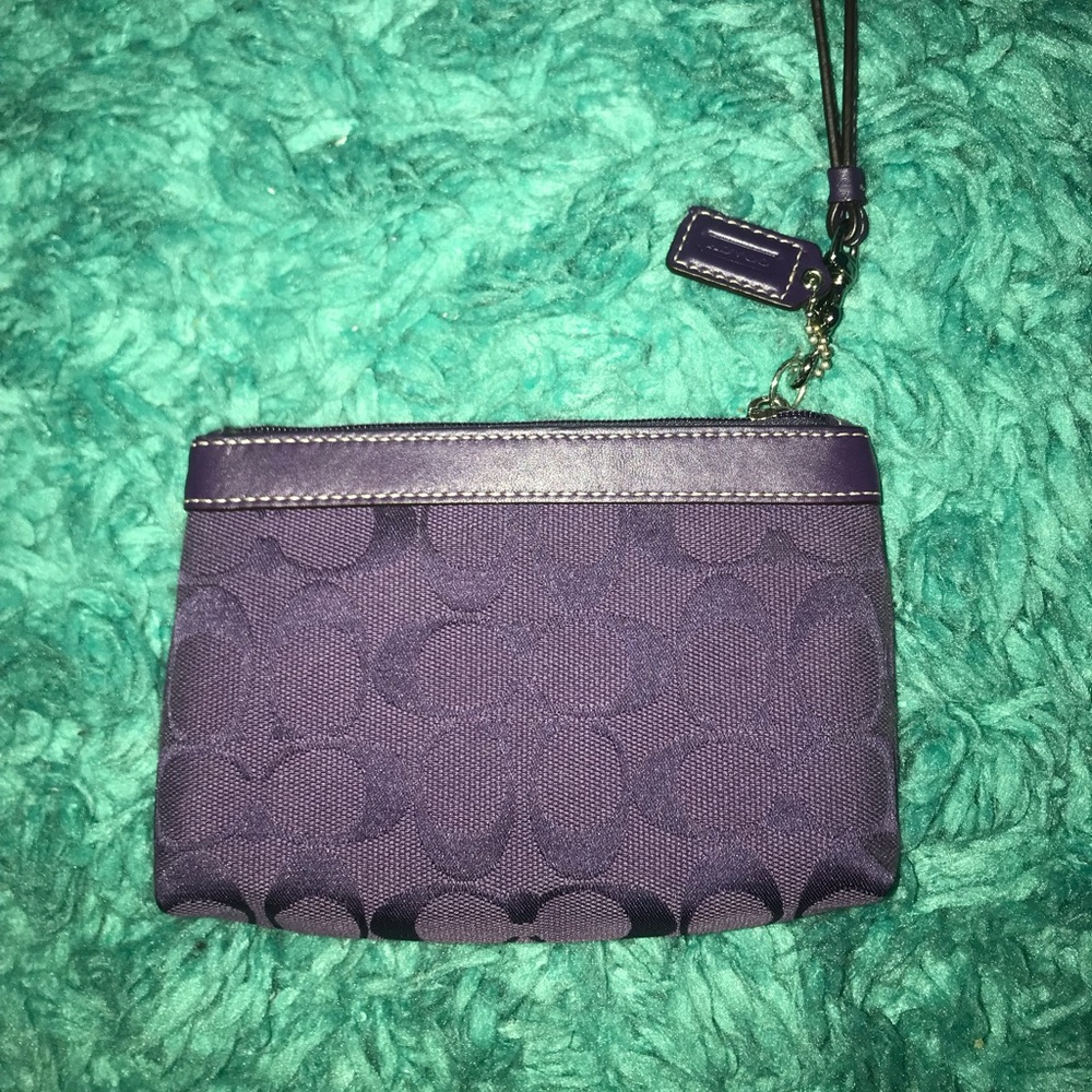 coach purple wristlet